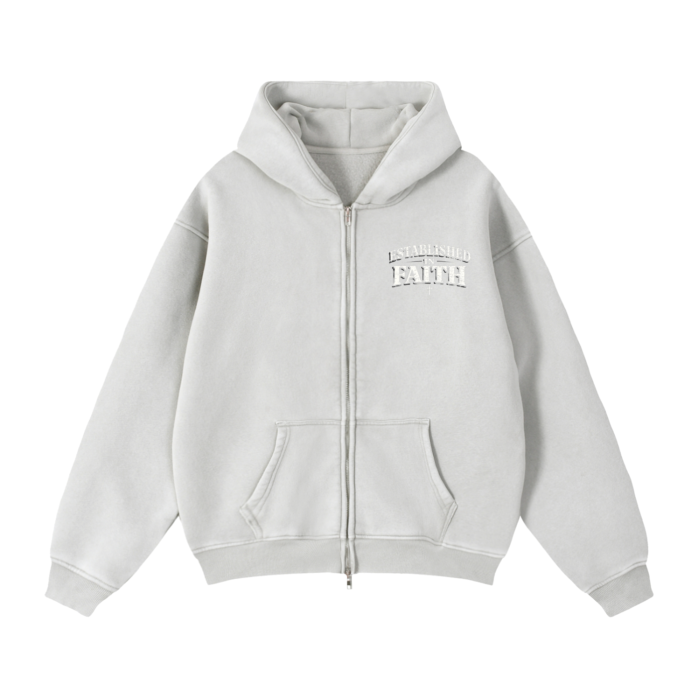 Young adult wearing oversized Christian hoodie outdoors